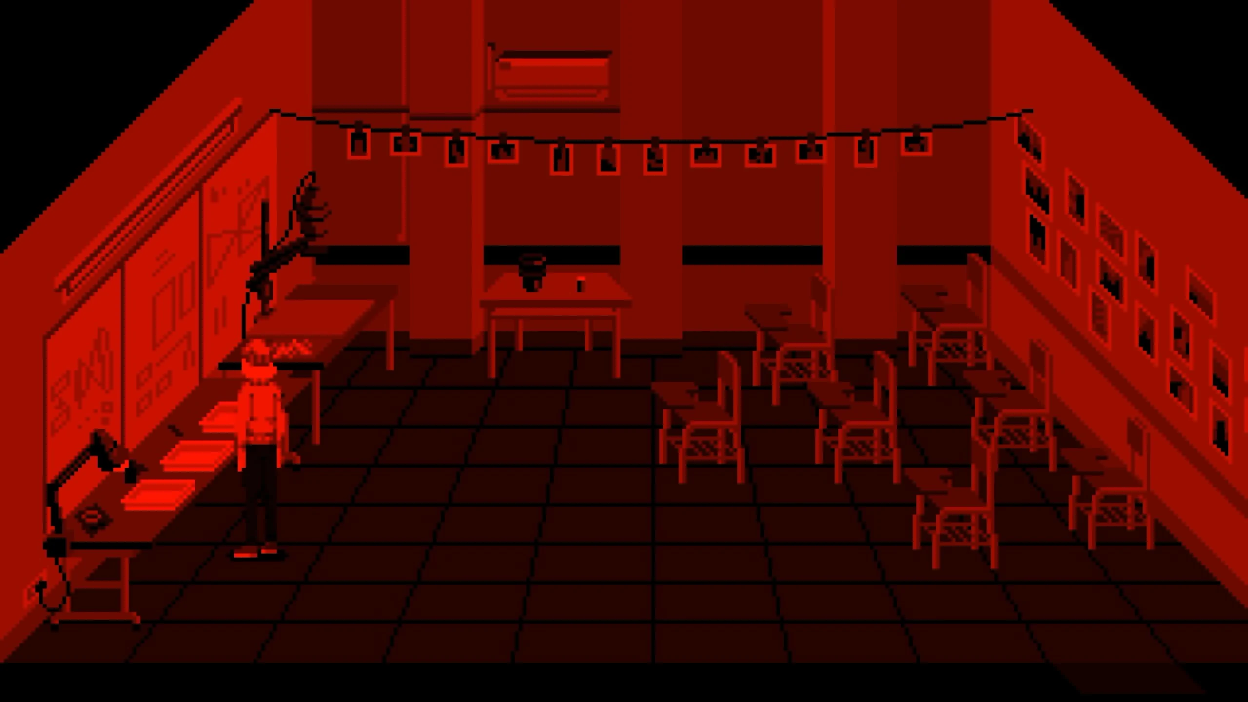 Julia in the photo room after red lighting has been installed
